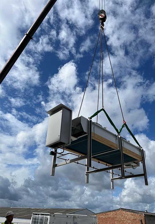 crane installing a fuel tank